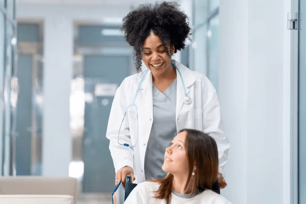 Smiling female doctor with patient