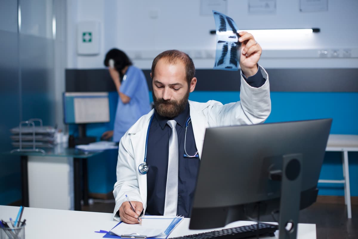 Doctor using AI-powered scribe